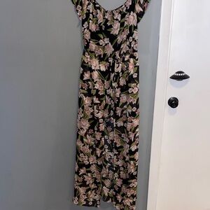 Chic Black Floral romper with flowy back